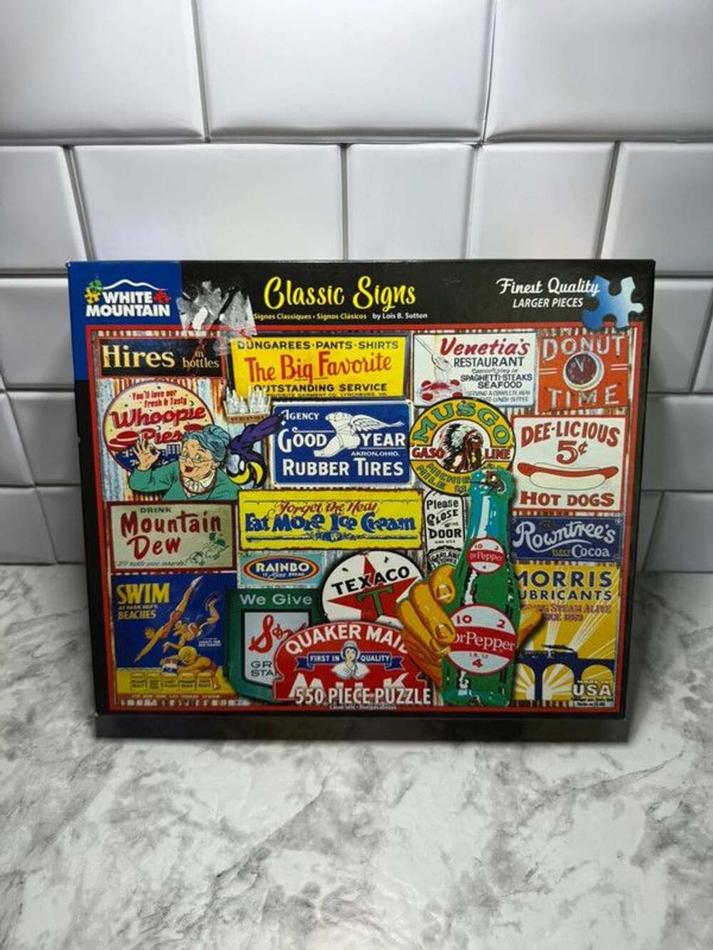 White Mountain Classic Signs 550 Piece Puzzle Lois B. Sutton 2020